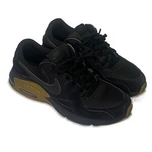 Nike Men's Black Athletic Sneakers with Gold Accents